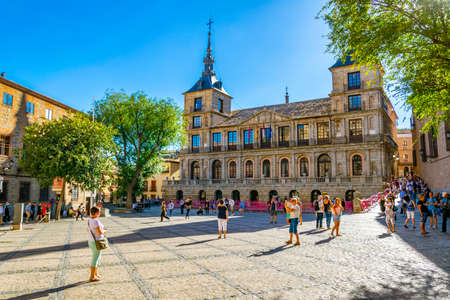 TOLEDO, SPAIN, OCTOBER 2, 2017: people are walking in front of the town hall in the historical center of Toledo, Spainのeditorial素材