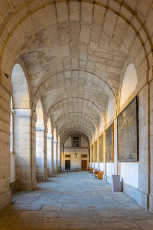 EL ESCORIAL, MADRID, OCTOBER 6, 2017: Corridor at the Royal Seat of San Lorenzo de El Escorial near...