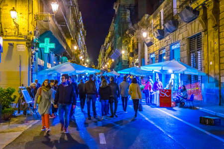 PALERMO, ITALY, APRIL 22, 2017: Night view of a narrow street in Palermo, Sicily, Italyのeditorial素材