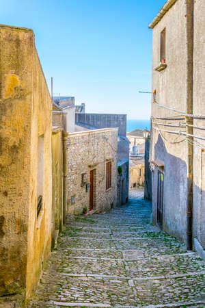 View of a narrow street in the historical center of Erice village on Sicily, Italyの写真素材