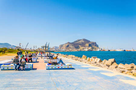 PALERMO, ITALY, APRIL 23, 2017: People are relaxing on the seaside promenade in Palermo, Sicily, Italyのeditorial素材