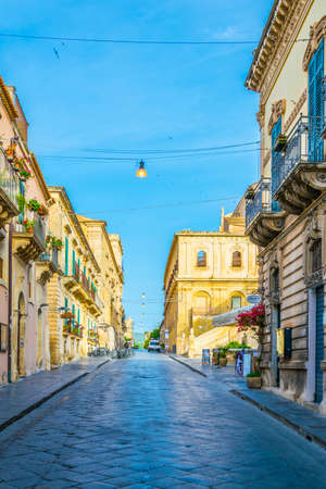 NOTO, ITALY, APRIL 26, 2017: People are strolling on the corso Vittorio Emanuele in Noto, Sicily, Italyのeditorial素材
