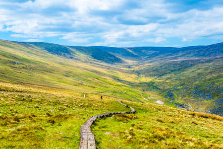 Aerial view of the upper and lower lake in Glendalough, Irelandの写真素材