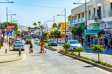 AGIA NAPA, CYPRUS, AUGUST 15, 2017: Street with plentiful tourist shops and restaurants at Agia Napa, Cyprusのeditorial素材