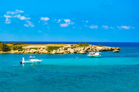 AKAMAS, CYPRUS, AUGUST 19, 2017:Tourist boats are mooring at Blue lagoon at Akamas peninsula on Cyprusのeditorial素材