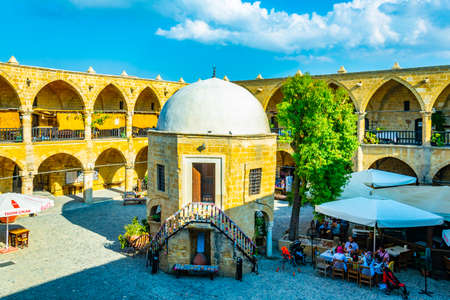 LEFKOSA, CYPRUS, AUGUST 24, 2017: View of a former merchant hotel - buyuk han - which has been converted into a modern tourist attraction, Lefkosa, Cyprusのeditorial素材