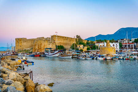 KYRENIA, CYPRUS, AUGUST 25, 2017: Sunset view over Kyrenia castle behind port, Cyprusのeditorial素材