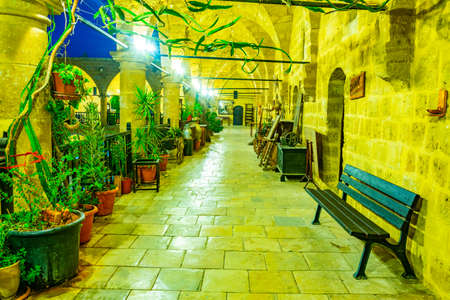 Night view of an arcade of Buyuk Han in Lefkosa, Cyprusの写真素材