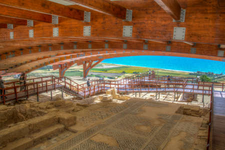 KOURION, CYPRUS, APRIL 7, 2018: Ruins of an ancient house with beautiful floor mosaics in ancient...