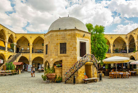 LEFKOSA, CYPRUS, AUGUST 29, 2017: View of a former merchant hotel - buyuk han - which has been converted into a modern tourist attraction, Lefkosa, Cyprusのeditorial素材
