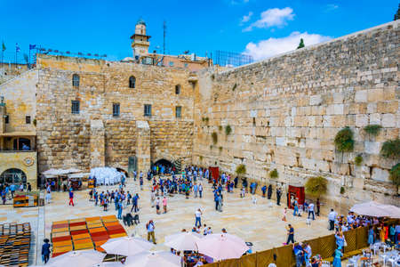 JERUSALEM, ISRAEL, SEPTEMBER 6, 2018: People are praying at the western wall in the old town of...