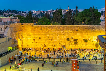 JERUSALEM, ISRAEL, SEPTEMBER 8, 2018: Sunset view of people are praying at the western wall in the old town of Jerusalem, Israelのeditorial素材