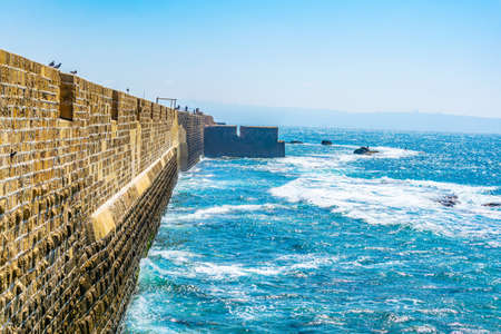 Medieval wall protecting Acre/Akko from the mediterranean sea in Israel