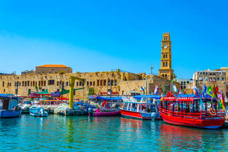 ACRE, ISRAEL, SEPTEMBER 12, 2018: Boats mooring in the old port of Akko/Acre, Israel
