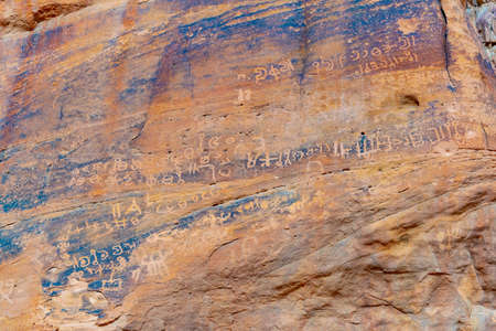 Ancient inscriptions at Lawrence spring at Wadi Rum desert in jordan