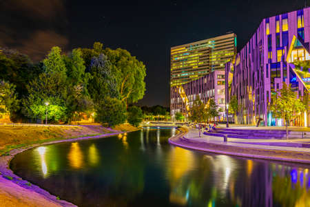 Night view of an illuminated channel in Hofgarten in Dusseldorf, Germany