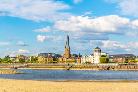 Riverside of Rhein in Dusseldorf with Saint Lambertus church, Germanyの写真素材