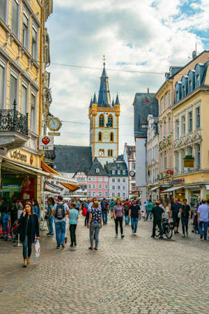 TRIER, GERMANY, AUGUST 14, 2018: People strolling on Simeonstrasse in trier, Germanyのeditorial素材