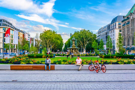 DUSSELDORF, GERMANY, AUGUST 10, 2018: People are passing Corneliusplatz in Dusseldorf, Germany