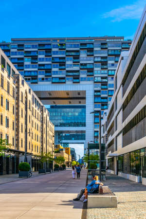 COLOGNE, GERMANY, AUGUST 11, 2018: people are admiring Kranhaus building complex on riverside of Rhein in Cologne, Germanyのeditorial素材