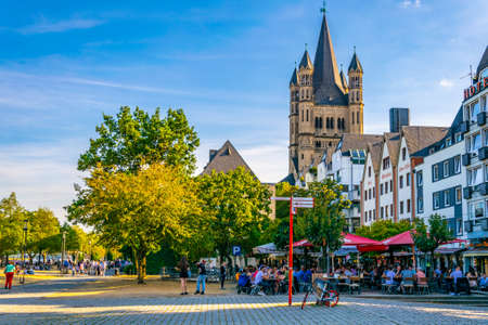 COLOGNE, GERMANY, AUGUST 11, 2018: Riverside promenade and Saint Martin church in Cologne, Germanyのeditorial素材