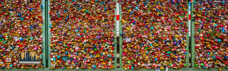 COLOGNE, GERMANY, AUGUST 11, 2018: Detail of love locks on Hohenzollern bridge in Cologne , Germanyのeditorial素材