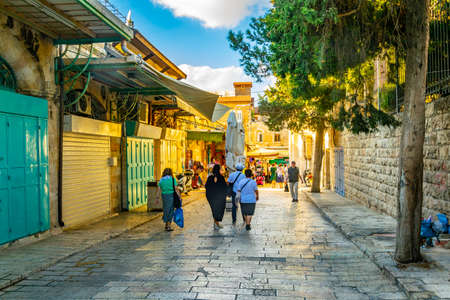 JERUSALEM, ISRAEL, SEPTEMBER 7, 2018: People are strolling in Mauristan district of the old town of...