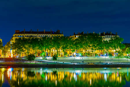 Night view of illuminated riverside of Rhone river in Lyon, Franceのeditorial素材