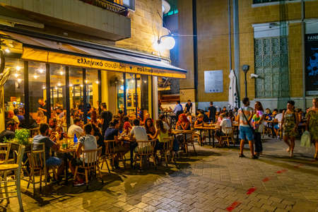 NICOSIA, CYPRUS, AUGUST 24, 2017: Night view of pedestrian center of Nicosia where tourists enjoy relaxing evening after a hot summer day, Cyprusのeditorial素材
