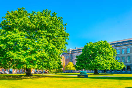 View of a building on the parliament square inside of the trinity college campus in Dublin, Irelandのeditorial素材