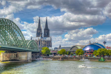 Cathedral in Cologne and Hohenzollern bridge over Rhein, Germanyのeditorial素材