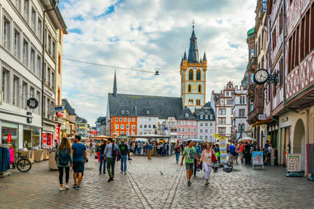 TRIER, GERMANY, AUGUST 14, 2018: People strolling on Simeonstrasse in trier, Germanyのeditorial素材