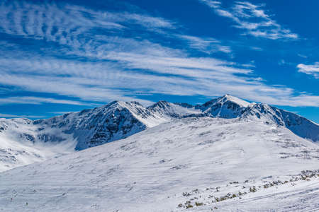 Musala mountain, the highest peak of Bulgaria, and surrounding mountains in Bulgaria during winterの写真素材