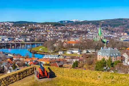Cannon at Kristiansten fortress aiming at historical center of Trondheim, Norwayの写真素材