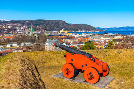 Cannon at Kristiansten fortress aiming at historical center of Trondheim, Norwayの写真素材