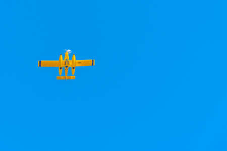 Hydroplane on blue sky seen from below