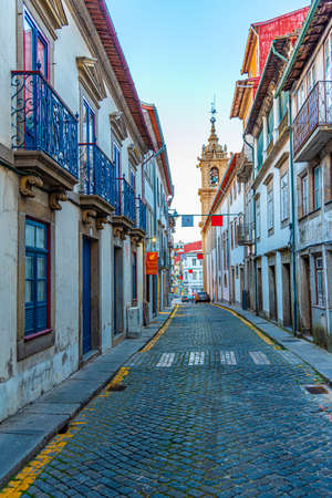 Narrow street leading to the Holy Cross church in Braga, Portugal