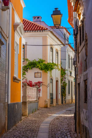 View of a narrow street of Cascais in Portugalの写真素材