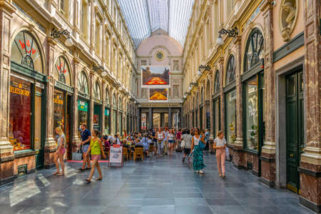 BRUSSELS, BELGIUM, AUGUST 4, 2018: People are strolling through the Royal gallery Saint Hubert in Brussels, Belgiumの写真素材