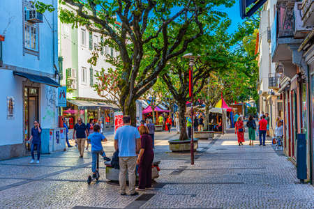 BRAGA, PORTUGAL, MAY 22, 2019: People are strolling through narrow street of historical center of Braga, Portugalの写真素材