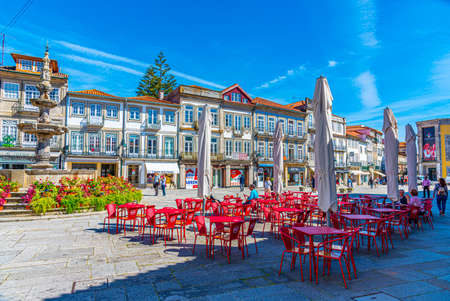 VIANA DO CASTELO, PORTUGAL, MAY 24, 2019: People are strolling at Placa da Republica square at Viana do Castelo in Portugalのeditorial素材