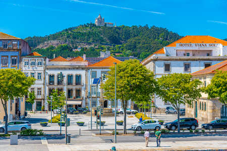 VIANA DO CASTELO, PORTUGAL, MAY 24, 2019: Colorful facades of houses on Lima riverside in Viana do Castelo in Portugalのeditorial素材