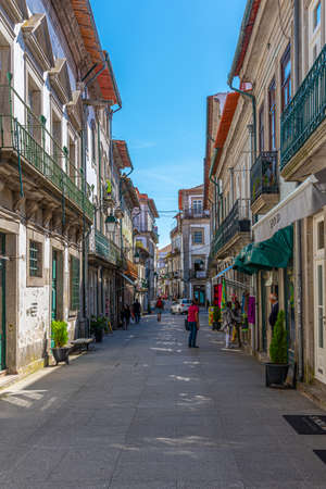 VIANA DO CASTELO, PORTUGAL, MAY 24, 2019: Narrow street in the historical center of Viana do Castelo in Portugalのeditorial素材
