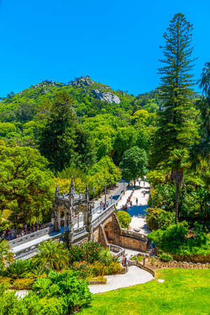 SINTRA, PORTUGAL, MAY 30, 2019:  People are strolling through grounds of Quinta da Regaleira palace in Sintra, Portugalのeditorial素材