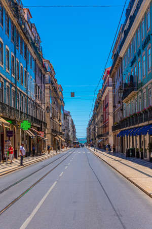 LISBON, PORTUGAL, MAY 29, 2019: People are strolling on street leading to Praca do Comercio in Lisbon, Portugalのeditorial素材
