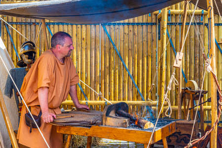 BRAGA, PORTUGAL, MAY 23, 2019: Reconstruction of roman workshops during Braga Romana festival in...