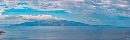 Silhouette of Corfu viewed from Sarande, Albaniaの写真素材