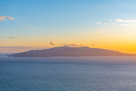 Silhouette of Corfu viewed from Sarande, Albaniaの写真素材