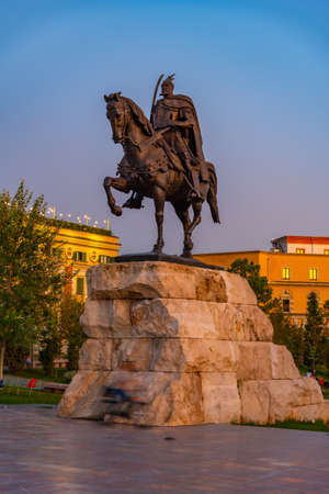 Sunset view of Skanderbeg statue at Tirana, Albaniaの写真素材