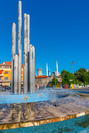 Ebu Bekr mosque viewed behind Democracy square in Shkoder, Albaniaのeditorial素材